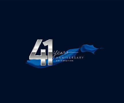 41st Years Anniversary celebration logotype silver colored with blue ribbon and isolated on dark blue background