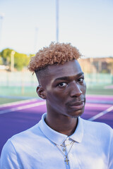 Close up portrait of handsome man with colorful hair