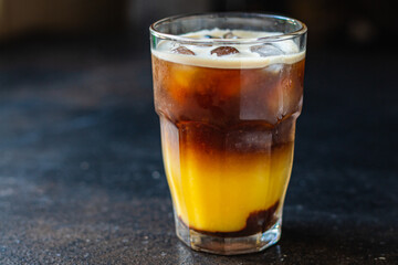 ice coffee orange juice beverage bumble bee cocktail on the table meal copy space food background rustic top view