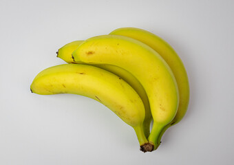 Banany na jasnym tle © PhotoHunter