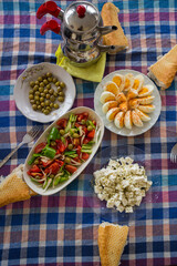 Breakfast table shot contains different types of foods. Turkish-Mediterrannean breakfast