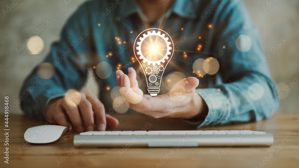 Aufkleber innovation. hands holding light bulb for concept new idea concept with innovation and inspiration, i