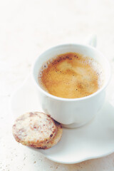 Cup of Coffee on bright stone background. Close up.	