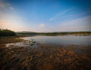 Sunset over the lake.  Chakkaphong Reservoir ( Khao Ito ),  Prachin Buri, Thailand.