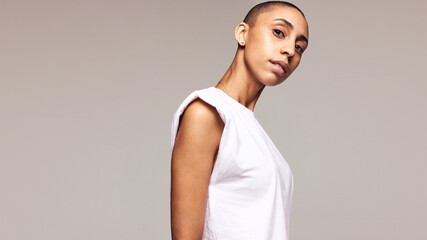 Androgynous female with shaved head