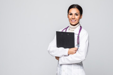 Young doctor with stethoscope and clipboard isolated on white background
