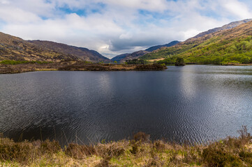 A view down the length of Loch Eilt, Scotland on a summers day