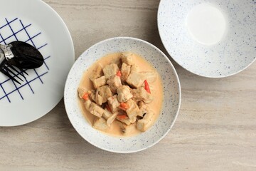 Top View SLodeh Tahu Tempe, Indonesian Traditional Food made from Tofu, Tempeh, and Coconut Milk. Spicy, Savoury for Daily Menu (Lodeh Jawa). Copy Space