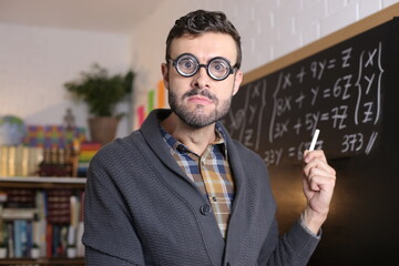 Math teacher with thick eyeglasses