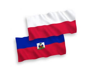 Flags of Republic of Haiti and Poland on a white background