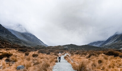 A Man walks at Hooker Valley Track in New Zealand
