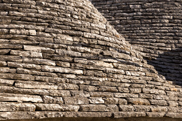 Beautiful town of Alberobello with typical trulli houses built from stone, main touristic district,...