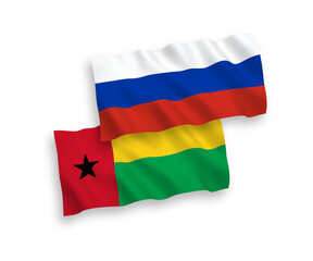 Flags of Republic of Guinea Bissau and Russia on a white background