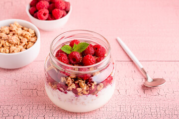 Healthy breakfast. Granola / muesli yoghurt and fruit.