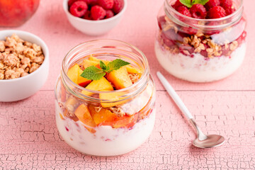 Healthy breakfast. Granola / muesli yoghurt and fruit.