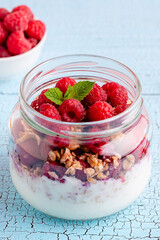 Healthy breakfast. Granola / muesli yoghurt and fruit.