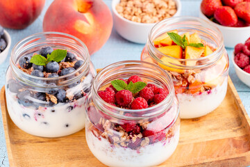 Healthy breakfast. Granola / muesli yoghurt and fruit.