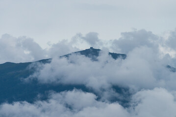 Mountain behind the clouds, summer nature landscape scene
