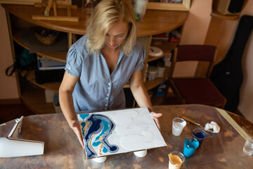 artist do interior painting. Happiness and creativity. Painting in interior. Hobbies and crafts. Learning to draw. Work at home.