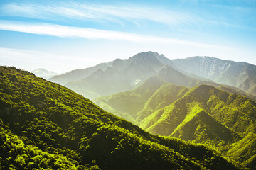 Amazing panoramic mountain view from Sequoia National Park, USA. Wonderful scenery from the cliff to the blue sky and mountains