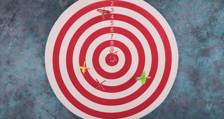 Business and success concept. Hitting in the target. Dartboard and arrow