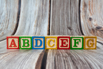Closeup shot of educational alphabet wooden blocks for kids