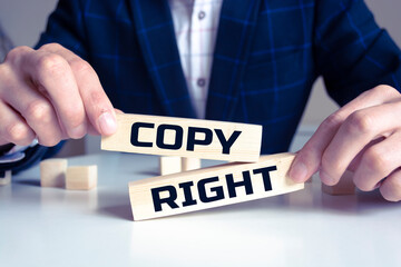 Obraz premium Copy Right word written on wood block. Search engine optimization. 