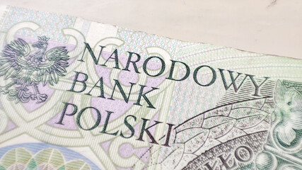 Macro PLN Polish 100 zloty banknotes background. One hundred zloty banknotes detail