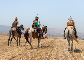 Horse and foot warriors - participants in the reconstruction of Horns of Hattin battle in 1187, are on the battle site, near TIberias, Israel