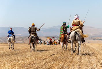 Horse and foot warriors - participants in the reconstruction of Horns of Hattin battle in 1187, are...