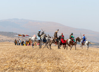 Horse and foot warriors - participants in the reconstruction of Horns of Hattin battle in 1187, are...