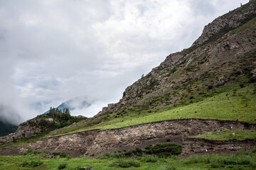 Mountain landscape with cloudy sky. Ongudaysky district, Altai Republic
