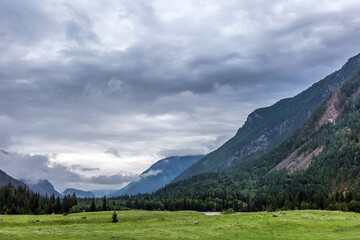 Mountain landscape with cloudy sky. Ongudaysky district, Altai Republic