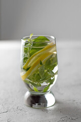 glass of water with mint and lemon