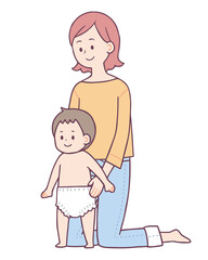 オムツ替えをする女性