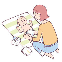 オムツ替えをする女性