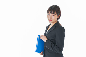 笑顔のスーツを着たビジネスウーマン