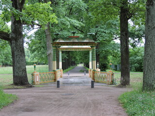 Chinese gate in summer park, Saint-Petersburg