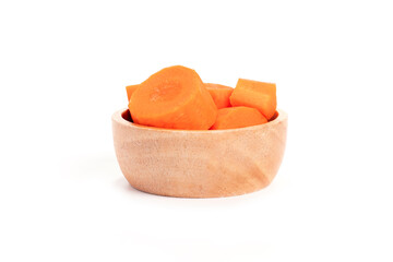carrot slices in a wooden cup isolated on white background. fresh carrots in a wooden cup. cooking ingredients