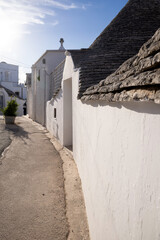 Beautiful town of Alberobello with typical trulli houses built from stone, main touristic district,...