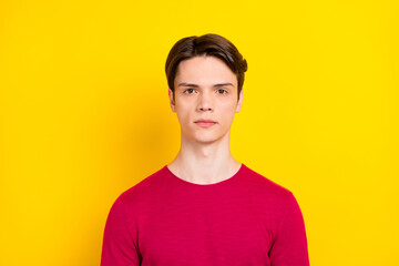 Photo of attractive charming young gentleman wear red pullover isolated yellow color background