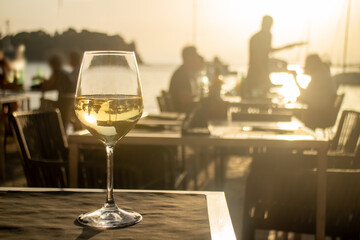 evening dining with white glass on table