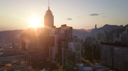 AERIAL. Top view of Hong Kong city at sunset.