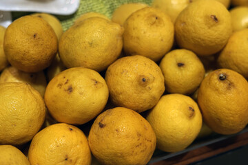 Fresh lemons from Asia market