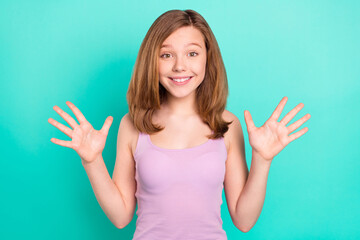 Photo portrait smiling schoolgirl in singlet excited isolated bright teal color background