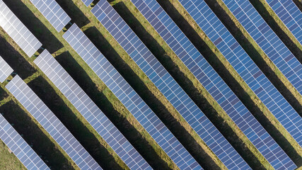 Aerial View of Solar Panels on a Ecological Farm. Electrical innovation nature environment