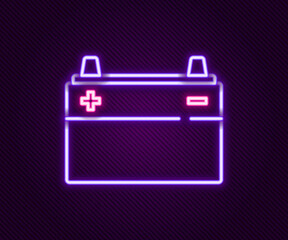Glowing neon line Car battery icon isolated on black background. Accumulator battery energy power and electricity accumulator battery. Colorful outline concept. Vector