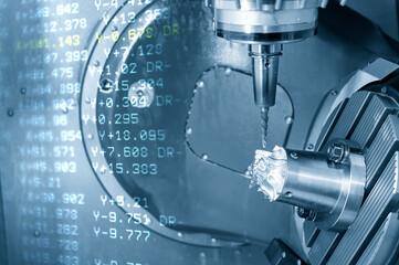 The abstract scene 5-axis  machining center cutting the turbocharger parts with G-code data back ground. The hi-precision automotive manufacturing process by multi-axis CNC milling machine.