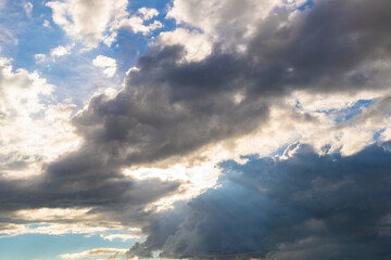 Dark sky background before a thunderstorm with light from the sky.