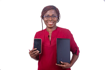 portrait of a beautiful businesswoman presenting a tablet and cellphone, happy.